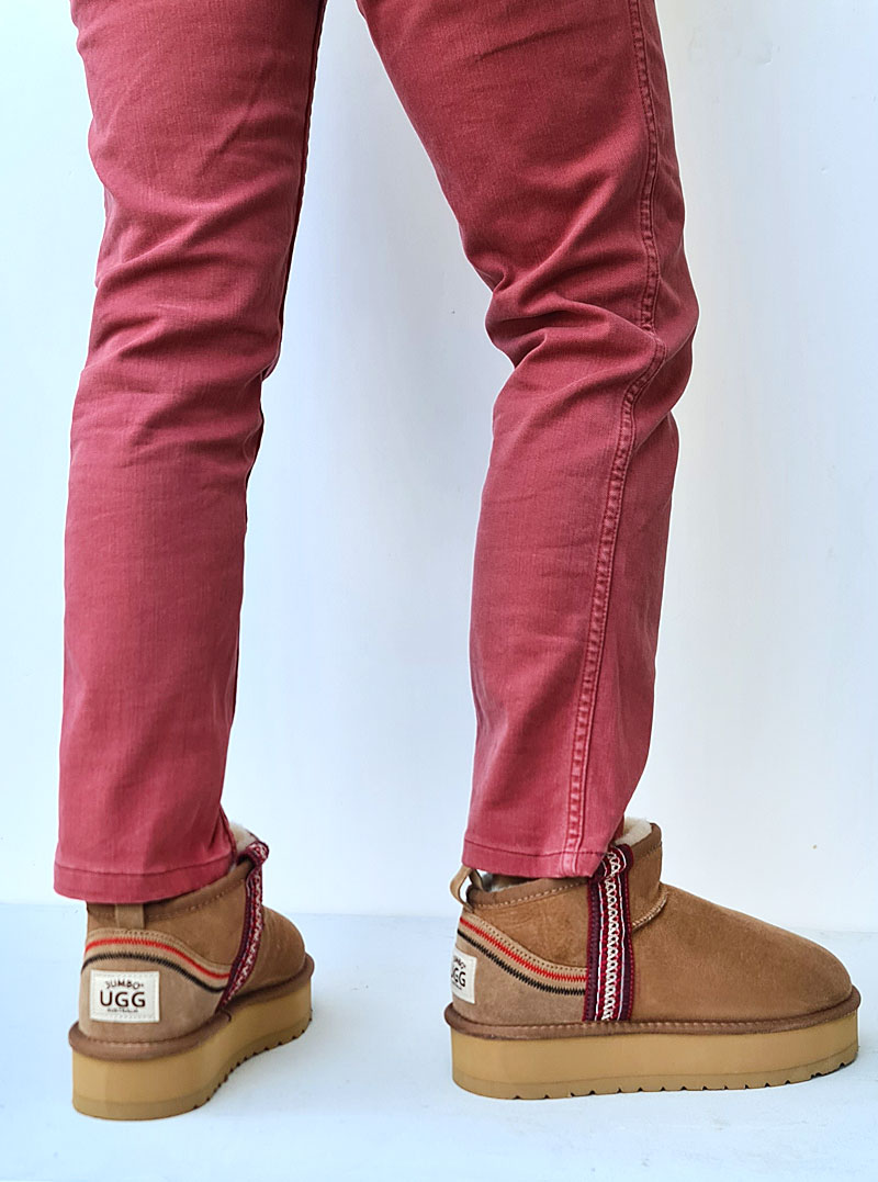 Pair with ripped jeans and a chunky sweater for laid-back style