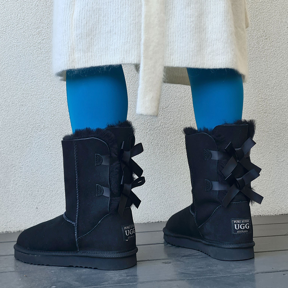 Featuring 2 satin ribbon bows detail on the back and available in Chocolate, Grey, Pink or Chestnut, these short boots are both cute and cozy